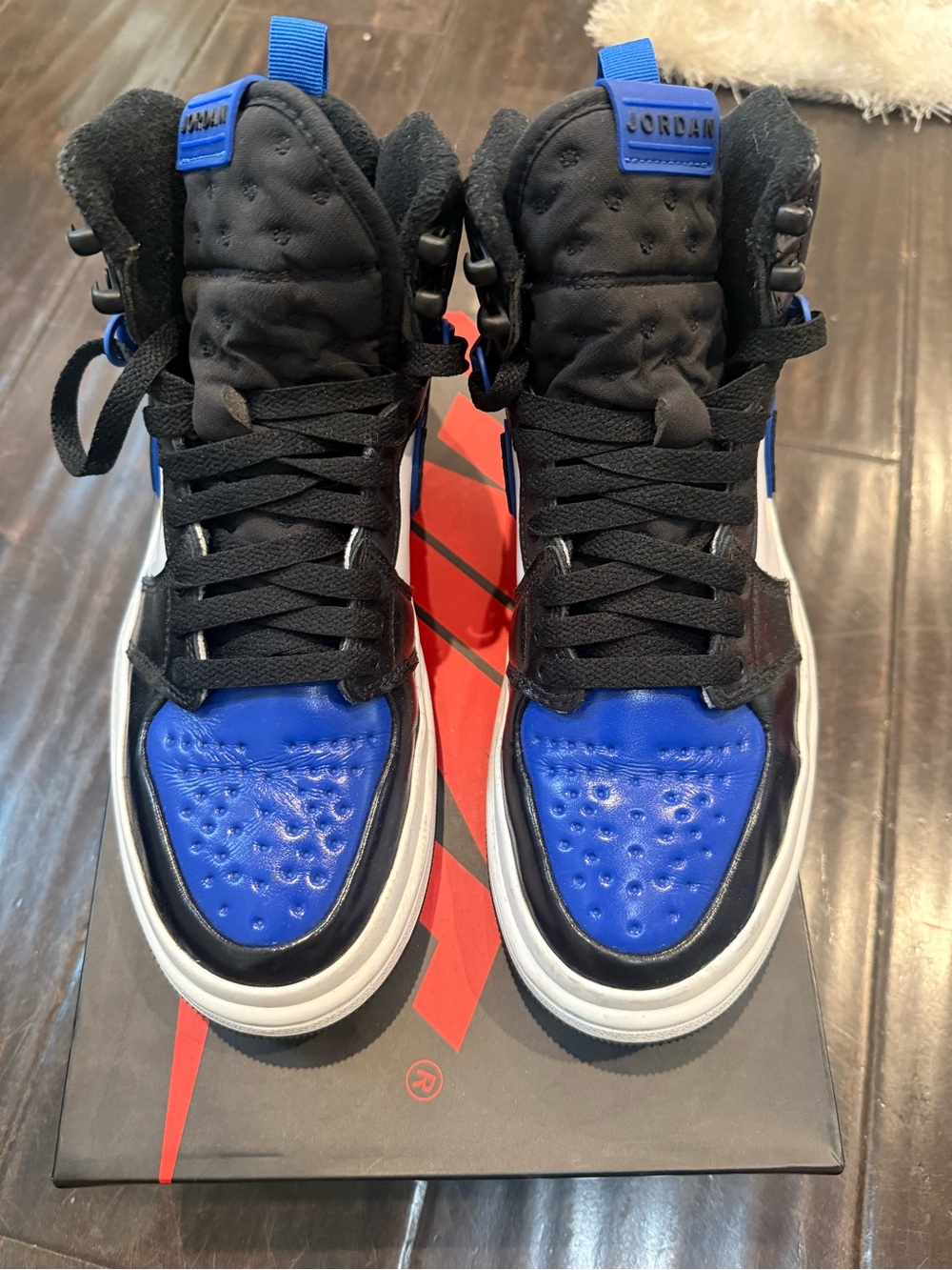 Jordan Men’s High-Top Sneakers in Black and Royal Blue